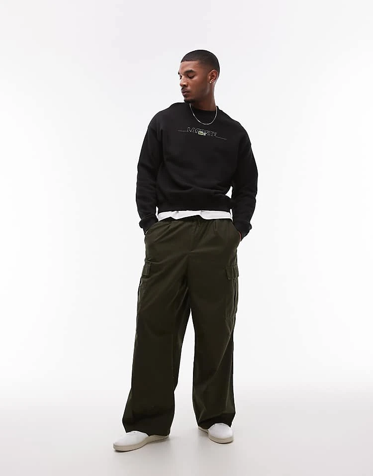 Lacoste Front Logo Sweatshirt In Black For Men 2 Lacoste Front Logo Sweatshirt In Black For Men - Image 2