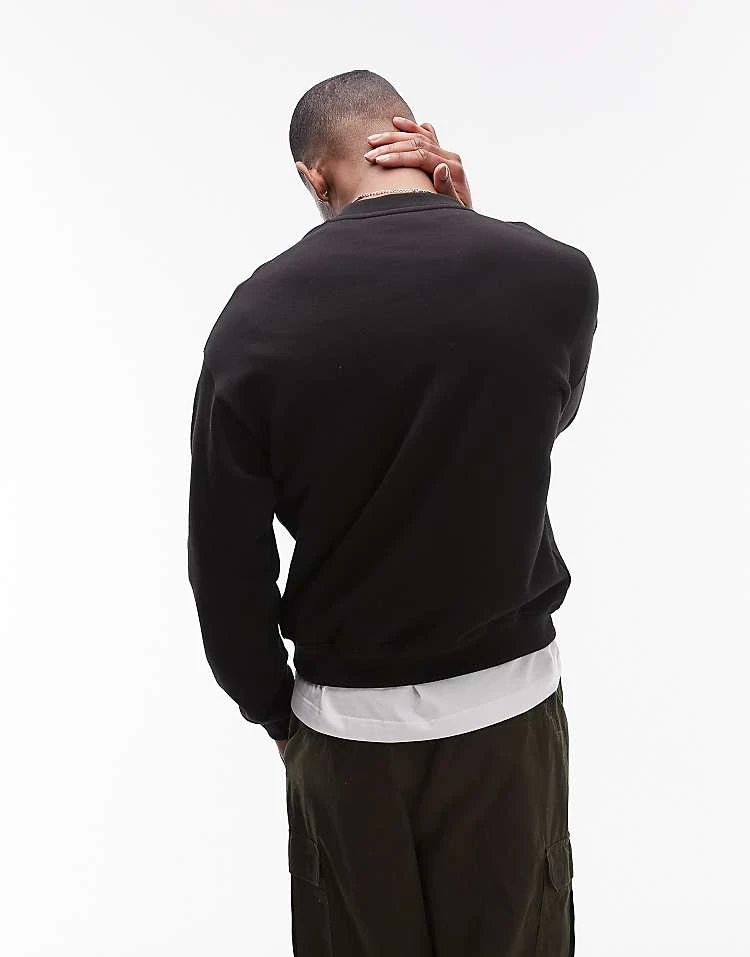 Lacoste Front Logo Sweatshirt In Black For Men 3 Lacoste Front Logo Sweatshirt In Black For Men - Image 3