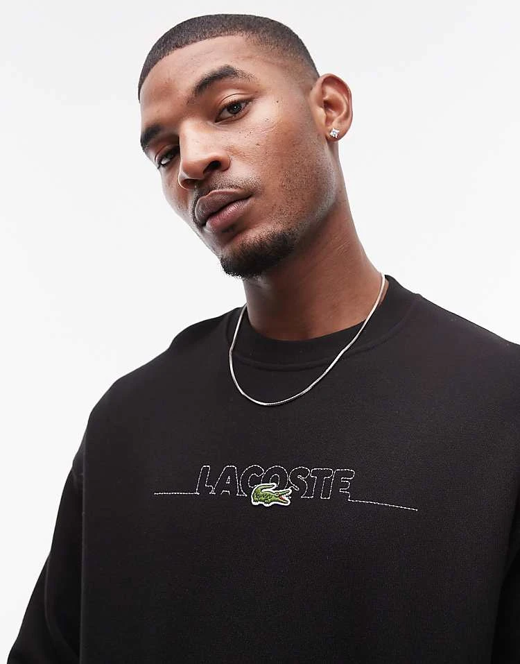 Lacoste Front Logo Sweatshirt In Black For Men 4 Lacoste Front Logo Sweatshirt In Black For Men - Image 4