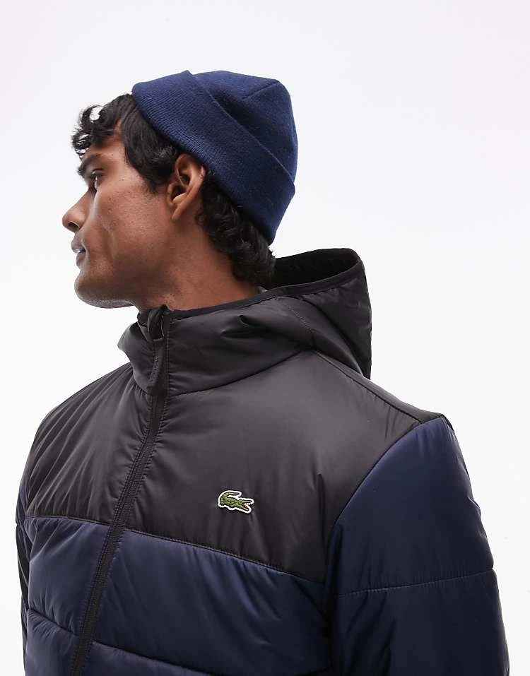 Lacoste Essentials Quilted Puffa Jacket In Navy Colour Block For Men 2 Lacoste Essentials Quilted Puffa Jacket In Navy Colour Block For Men - Image 2