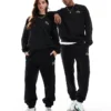Lacoste Unisex Logo Sweatpants In Black For Unisex