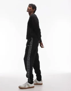 Lacoste Logo Stripe Joggers In Black For Men