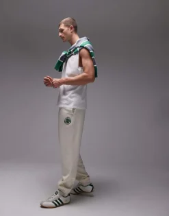 Lacoste Joggers In White With Tennis Emblem For Men