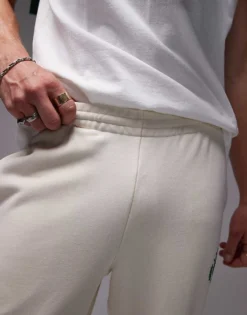 Lacoste Joggers In White With Tennis Emblem For Men -Clothes Fashion Store 207665408 3