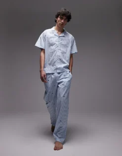 Lacoste Loungewear Trousers In Light Blue With All Over Croc Print For Men